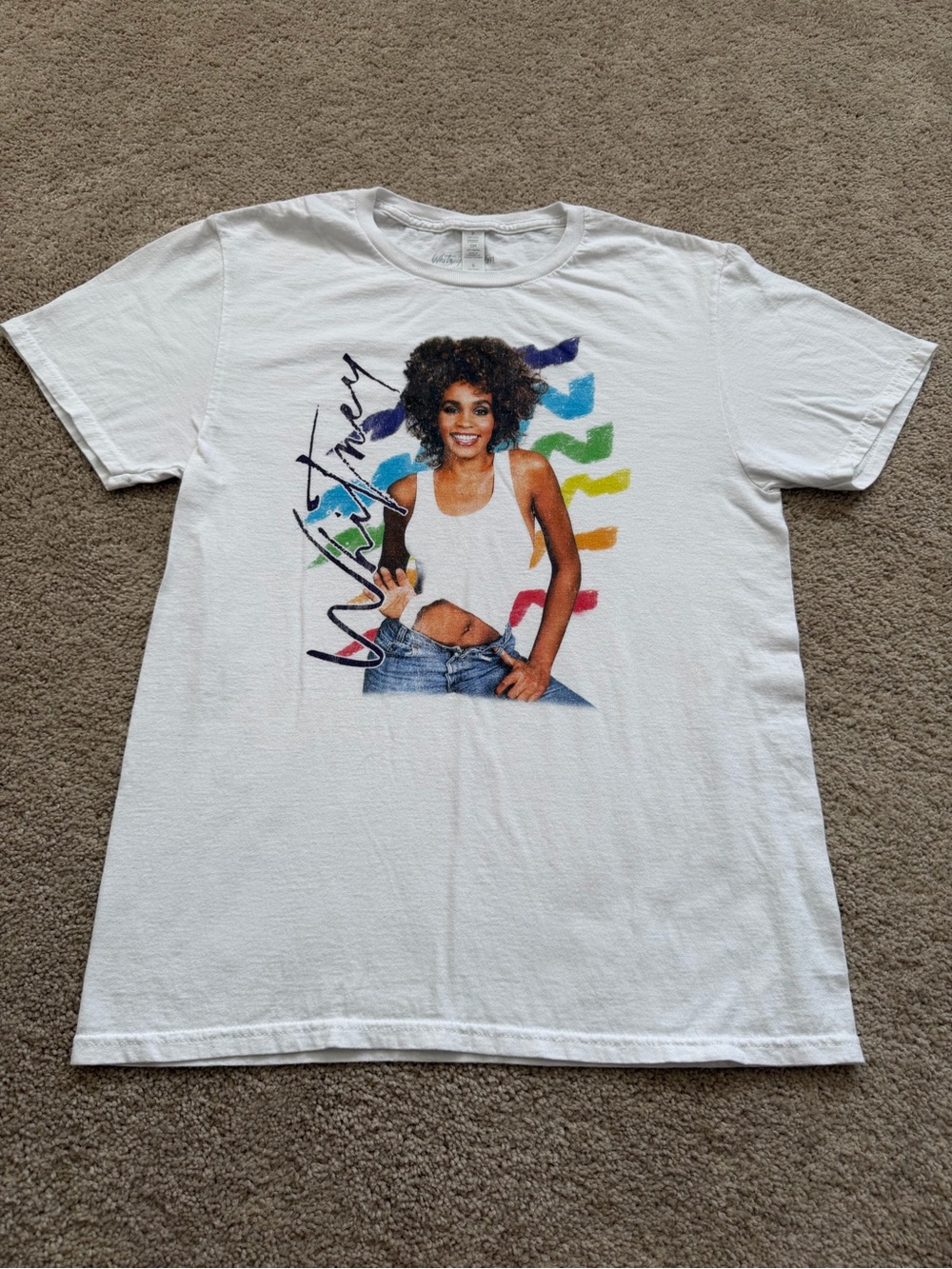 Whitney Houston graphic t-shirt featuring a vintage portrait from her 1987 album